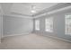 Bright bedroom featuring recessed ceilings and lots of natural light from multiple windows at 2393 Strand Ave, Lawrenceville, GA 30043