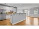Open-concept kitchen with stainless steel appliances and a large island perfect for entertaining at 2393 Strand Ave, Lawrenceville, GA 30043
