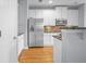 Modern kitchen with stainless steel appliances and white cabinetry at 2393 Strand Ave, Lawrenceville, GA 30043