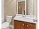 Bathroom boasts marble countertop, wood cabinets, and classic fixtures at 3070 Staglin Dr, Powder Springs, GA 30127