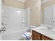 Clean bathroom with a tub-shower combo, vanity sink, and modern fixtures at 3070 Staglin Dr, Powder Springs, GA 30127