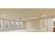 Large bonus room with natural light from windows and adjacent bathroom at 3070 Staglin Dr, Powder Springs, GA 30127