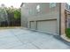 Exterior view of a three-car garage at 3070 Staglin Dr, Powder Springs, GA 30127