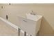 Laundry room featuring a utility sink for added convenience at 3070 Staglin Dr, Powder Springs, GA 30127