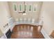 Dramatic living room with soaring ceilings, a cozy fireplace, and an abundance of natural light at 3070 Staglin Dr, Powder Springs, GA 30127