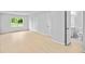 Spacious room with light wood floors, two closets and an attached bathroom at 3481 Oak Run Dr, Lithonia, GA 30038
