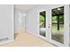 Bright hallway leads to a covered deck at 3481 Oak Run Dr, Lithonia, GA 30038