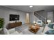 Comfortable living room with staircase, recessed lighting and neutral decor for a spacious feel at 3481 Oak Run Dr, Lithonia, GA 30038