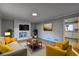 Cozy living room showcasing a decorative fireplace, recessed lighting, and contemporary furniture arrangement at 3481 Oak Run Dr, Lithonia, GA 30038