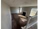 Upstairs view of a spacious living room featuring a fireplace and multiple windows for plenty of natural light at 870 Pine Shoals Dr, Atlanta, GA 30349