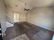 Spacious living room featuring vaulted ceilings, a ceiling fan, with stairs and other rooms visible at 870 Pine Shoals Dr, Atlanta, GA 30349