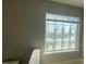 A bathroom window provides natural light to the space, along with a garden tub at 870 Pine Shoals Dr, Atlanta, GA 30349