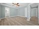 Large bedroom with vinyl floors and neutral walls at 2494 Baxter Rd, Atlanta, GA 30315