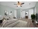 Staged primary bedroom with neutral decor and vinyl floors at 2494 Baxter Rd, Atlanta, GA 30315