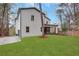 Exterior of home with expansive grassy backyard at 2497 Wawona Ne Dr, Brookhaven, GA 30319