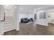 Finished basement area with stairs leading down, comfortable seating, and easy access to the outside at 2497 Wawona Ne Dr, Brookhaven, GA 30319