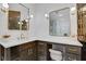 Bathroom with a unique honeycomb tile wall, quartz countertop, and makeup vanity at 2497 Wawona Ne Dr, Brookhaven, GA 30319
