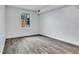 Bedroom showcasing wood floors, a window, and neutral walls at 2497 Wawona Ne Dr, Brookhaven, GA 30319
