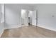 Neutral bedroom with hardwood floors, en suite access, and closet at 2497 Wawona Ne Dr, Brookhaven, GA 30319