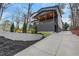 Lovely home showcasing the extended driveway and landscaped yard at 2497 Wawona Ne Dr, Brookhaven, GA 30319