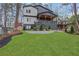 Charming home with a covered porch and a lush green lawn at 2497 Wawona Ne Dr, Brookhaven, GA 30319