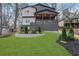 Beautiful two-story home with covered porch and well-manicured landscaping at 2497 Wawona Ne Dr, Brookhaven, GA 30319