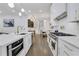 Galley kitchen with modern appliances, custom cabinetry, and seamless design at 2497 Wawona Ne Dr, Brookhaven, GA 30319