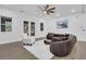 Open-concept living room with hardwood floors and a cozy seating area at 2497 Wawona Ne Dr, Brookhaven, GA 30319
