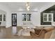 Bright living room with lots of light, hard wood floors and modern furniture at 2497 Wawona Ne Dr, Brookhaven, GA 30319