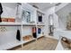 Spacious walk-in closet with custom shelving and organized storage solutions at 2497 Wawona Ne Dr, Brookhaven, GA 30319