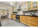 Well-lit kitchen with stylish cabinets, stainless steel appliances, and a tile backsplash at 2519 Lauderdale Ne Dr, Atlanta, GA 30345