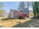 Backyard featuring a deck and gray siding at 6265 Stoney Cv, Austell, GA 30168