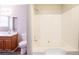 Bathroom with vanity, toilet, and tub/shower combination at 6265 Stoney Cv, Austell, GA 30168