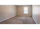 Bedroom featuring carpet and a window for natural light at 6265 Stoney Cv, Austell, GA 30168