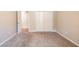 Bedroom featuring carpet, a closet, and neutral walls, creating a cozy space at 6265 Stoney Cv, Austell, GA 30168