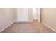 Bedroom featuring carpet, a closet, and neutral walls, creating a bright space at 6265 Stoney Cv, Austell, GA 30168