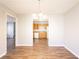 Dining room leading to a kitchen, perfect for Gathering meals and entertaining guests at 6265 Stoney Cv, Austell, GA 30168