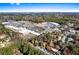 A captivating aerial shot displays the property's proximity to shopping and green space at 838 Lake Hollow Sw Blvd, Marietta, GA 30064
