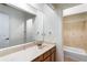 The bright bathroom has a long vanity, updated fixtures, and a tub/shower at 838 Lake Hollow Sw Blvd, Marietta, GA 30064