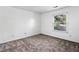 Neutral bedroom with large window offering natural light at 838 Lake Hollow Sw Blvd, Marietta, GA 30064