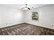 Neutral bedroom features a window and carpeted floors, suitable for relaxation at 838 Lake Hollow Sw Blvd, Marietta, GA 30064