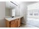 Bathroom with a granite counter, undermount sink and view to a bright bedroom at 2873 Snapfinger Mnr, Decatur, GA 30035