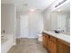 Bathroom featuring tile floor, shower stall, large tub, and granite countertop vanity at 2873 Snapfinger Mnr, Decatur, GA 30035