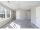 Bright bedroom with neutral colors, plush carpet, and ensuite bathroom access at 2873 Snapfinger Mnr, Decatur, GA 30035