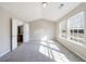 Spacious bedroom with vaulted ceiling, plush carpeting, and natural light at 2873 Snapfinger Mnr, Decatur, GA 30035