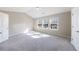 Bedroom boasts vaulted ceiling, carpeted floor, and lots of natural light at 2873 Snapfinger Mnr, Decatur, GA 30035