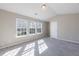 Inviting bedroom with lots of natural light, neutral color palette, and plush carpeting at 2873 Snapfinger Mnr, Decatur, GA 30035