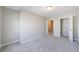 Bedroom with carpeting, white doors, and neutral paint at 2873 Snapfinger Mnr, Decatur, GA 30035