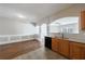 Bright eat-in kitchen features a seamless breakfast bar, stylish wood cabinets and modern appliances at 2873 Snapfinger Mnr, Decatur, GA 30035