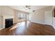 This living room features hardwood floors, lots of natural light, and a black marble fireplace at 2873 Snapfinger Mnr, Decatur, GA 30035